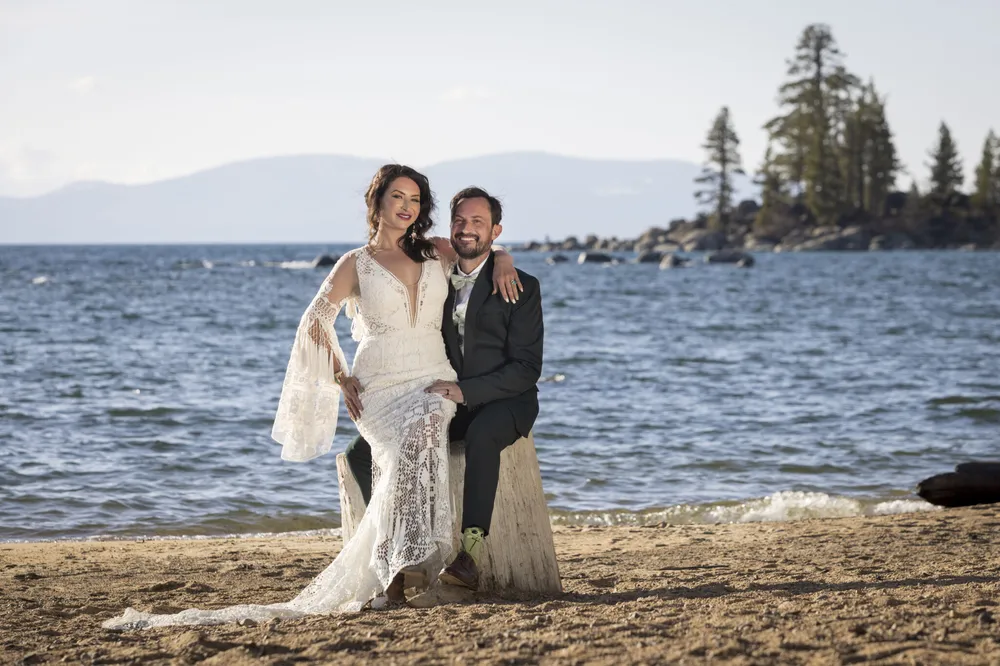 Lake Tahoe wedding ceremony at sunset with mountain backdrop